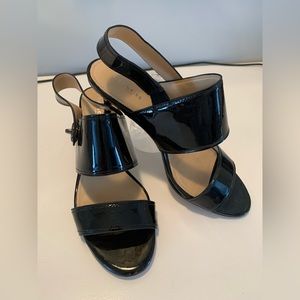 Beautiful Coach black patent leather heels.